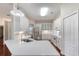 Bright kitchen featuring white cabinetry, stainless steel appliances, and ample counter space at 24 Katrinas Dr, Ormond Beach, FL 32174