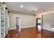 Spacious living room with hardwood floors and access to other rooms at 24 Katrinas Dr, Ormond Beach, FL 32174