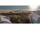 Beach view from the townhomes, showing the ocean and the coastline at 3000 Ocean Shore Blvd # 18, Ormond Beach, FL 32176