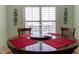 Elegant dining room with a round table and decorative accents at 3000 Ocean Shore Blvd # 18, Ormond Beach, FL 32176