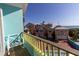 Balcony view of the colorful houses and clear blue skies at 3000 Ocean Shore Blvd # 18, Ormond Beach, FL 32176