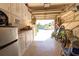 Well-organized garage with storage, bikes and beach gear at 3000 Ocean Shore Blvd # 18, Ormond Beach, FL 32176