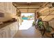 Spacious garage with storage, bikes and beach gear at 3000 Ocean Shore Blvd # 18, Ormond Beach, FL 32176