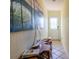 Entryway features a beautiful console table and decorative artwork at 3000 Ocean Shore Blvd # 18, Ormond Beach, FL 32176
