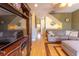 Inviting living room featuring hardwood floors and a comfortable sectional sofa at 3000 Ocean Shore Blvd # 18, Ormond Beach, FL 32176