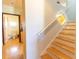 Bright stairway leading to the second floor of the home at 3000 Ocean Shore Blvd # 18, Ormond Beach, FL 32176