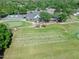 Aerial view of the clubhouse and golf course at 3132 Connemara Dr, Ormond Beach, FL 32174