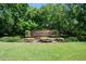 Halifax Plantation community entrance with lush landscaping and a brick sign for a welcoming neighborhood entry at 3132 Connemara Dr, Ormond Beach, FL 32174