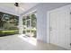 Screened patio, view to the lawn and door at 3132 Connemara Dr, Ormond Beach, FL 32174