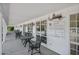 Outdoor patio with comfortable seating and views of the surrounding landscape at 3132 Connemara Dr, Ormond Beach, FL 32174