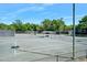 Enjoy multiple well-maintained tennis courts complete with covered benches for players and spectators at 3132 Connemara Dr, Ormond Beach, FL 32174