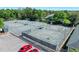 Aerial view of fenced community tennis courts and adjacent parking at 3132 Connemara Dr, Ormond Beach, FL 32174