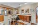 Dual vanities, mirrors, and a seating area create a functional bathroom space at 466 Leland Dr, Deltona, FL 32725
