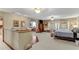 Large primary bedroom featuring a seating area and adjacent wet bar at 466 Leland Dr, Deltona, FL 32725