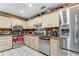 Efficient kitchen featuring stainless steel appliances and ample counter space at 466 Leland Dr, Deltona, FL 32725