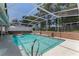 Relaxing screened-in pool with clear water offers a refreshing retreat and a spot to unwind in a serene setting at 466 Leland Dr, Deltona, FL 32725