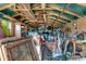Interior of a storage shed, showcasing ample storage capacity with organized shelves and various items at 466 Leland Dr, Deltona, FL 32725