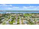From above, a charming single-story home nestled in a cozy residential neighborhood, near a waterway at 1026 Bel Aire Dr, Daytona Beach, FL 32118