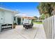 Enjoy outdoor dining on this spacious patio with seating, perfect for relaxing and entertaining at 1026 Bel Aire Dr, Daytona Beach, FL 32118