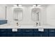 Bright bathroom featuring double vanity with undermount sinks and modern fixtures at 1026 Bel Aire Dr, Daytona Beach, FL 32118