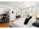 Spacious main bedroom with an organized closet/office and a comfy bed at 1026 Bel Aire Dr, Daytona Beach, FL 32118