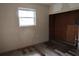 Bedroom featuring natural light from a window and an open closet space at 1131 Martha Dr, Daytona Beach, FL 32114