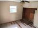 Bedroom featuring natural light, ceiling fan and an open closet space at 1131 Martha Dr, Daytona Beach, FL 32114