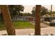 Single-story home featuring fresh paint, a tidy front yard, a new roof, and wooden garage doors at 1131 Martha Dr, Daytona Beach, FL 32114