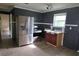 Kitchen area showcasing stainless steel appliances, sink, and ample space for cooking at 1131 Martha Dr, Daytona Beach, FL 32114
