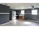 Spacious kitchen featuring stainless steel appliances, two windows, and modern flooring at 1131 Martha Dr, Daytona Beach, FL 32114