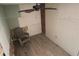 Unfinished room featuring light flooring, ceiling fan and exposed brick at 1131 Martha Dr, Daytona Beach, FL 32114