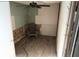 Unfinished room featuring light flooring, ceiling fan and exposed insulation at 1131 Martha Dr, Daytona Beach, FL 32114