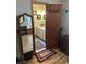 The bathroom has a white vanity, marble countertop, and pale green walls at 1218 Daytona Ave, Daytona Beach, FL 32117
