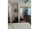 Bedroom featuring hardwood floors, ceiling fan, and closet with mirrored doors at 1218 Daytona Ave, Daytona Beach, FL 32117