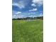 Vast green space at the community park featuring a splash pad and covered picnic areas at 1218 Daytona Ave, Daytona Beach, FL 32117