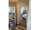 Hallway leading to a bedroom and bathroom at 1218 Daytona Ave, Daytona Beach, FL 32117