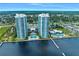 Breathtaking aerial view of twin luxury condominium towers along the waterfront, showcasing resort-style amenities at 231 Riverside Dr # 1602, Holly Hill, FL 32117