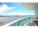 Expansive balcony view overlooking the city skyline and waterfront with comfortable outdoor seating at 231 Riverside Dr # 1602, Holly Hill, FL 32117