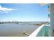Enjoy waterfront views from this balcony, which overlooks a bridge and distant city skyline at 231 Riverside Dr # 1602, Holly Hill, FL 32117