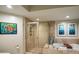 The bathroom features a glass shower, garden tub, and tasteful decorations at 231 Riverside Dr # 1602, Holly Hill, FL 32117