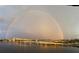 Beautiful rainbow over the city skyline with a bridge and bay view at 231 Riverside Dr # 1602, Holly Hill, FL 32117