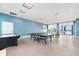 Spacious game room featuring ping pong, air hockey, and other recreational games for residents at 231 Riverside Dr # 1602, Holly Hill, FL 32117