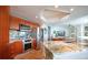 Modern kitchen showcasing an island with marble countertops, stainless steel appliances, and custom cabinetry at 231 Riverside Dr # 1602, Holly Hill, FL 32117