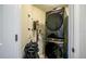 Compact laundry room equipped with modern Samsung washer and dryer and vacuum at 231 Riverside Dr # 1602, Holly Hill, FL 32117