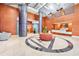 Grand lobby with marble floors, decorative columns, and a reception desk in a modern building at 231 Riverside Dr # 1602, Holly Hill, FL 32117