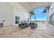 Inviting outdoor patio seating area with stylish wicker furniture and views at 231 Riverside Dr # 1602, Holly Hill, FL 32117