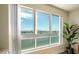 Bright room featuring a large window with stunning waterfront and city views at 231 Riverside Dr # 1602, Holly Hill, FL 32117