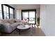 Relaxing living room boasts a comfortable sofa, marble coffee table, and balcony access at 2360 Ocean Shore Blvd # 10, Ormond Beach, FL 32176