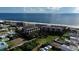 Aerial view of the coastal property near the ocean with lush landscaping at 2360 Ocean Shore Blvd # 17, Ormond Beach, FL 32176