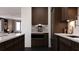 Modern kitchen with sleek cabinets and countertops featuring high-end appliances at 2360 Ocean Shore Blvd # 7, Ormond Beach, FL 32176
